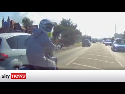 Road rage driver knocks motorcyclist off bike after 50mph chase