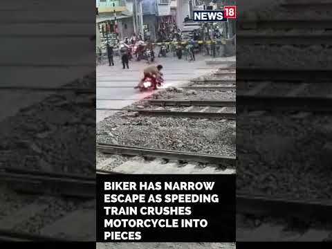 Bike Train Accident News | Biker Escapes Deadly Train Accident | #Shorts | CNN News18