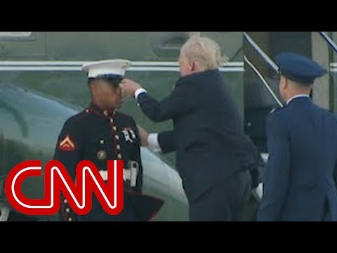 Trump stops to retrieve Marine&#039;s hat